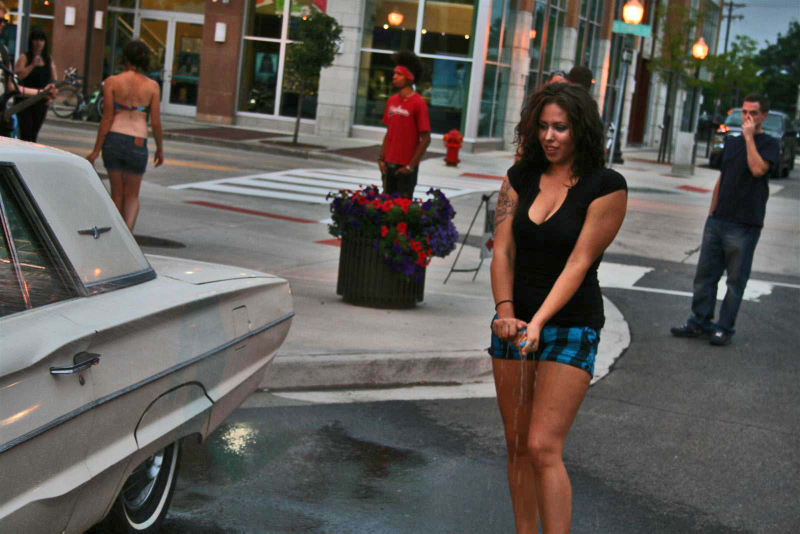 Illustration for article titled Noir Leather Bikini Car Wash Meetup Pictures